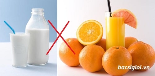 Không uống sữa khi ăn cam